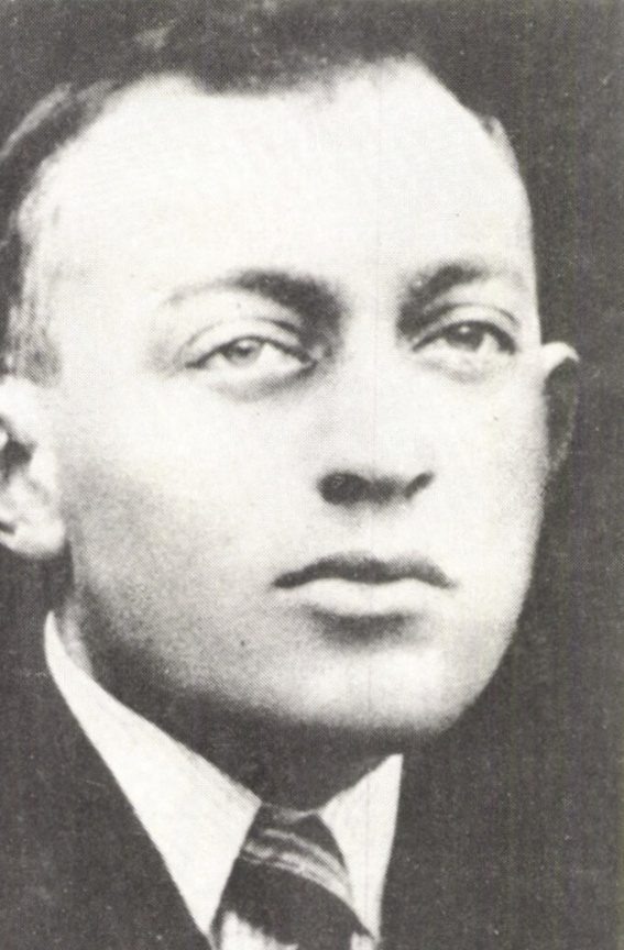 Bohumir Netolicka, grainy black and white head and shoulders portrait of a young man in a suit and striped tie