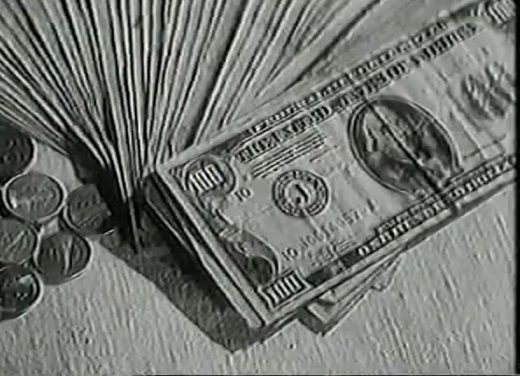 A black and white evidence photograph of a fan of hundred dollar bills and a scatter of coins laid out on a table