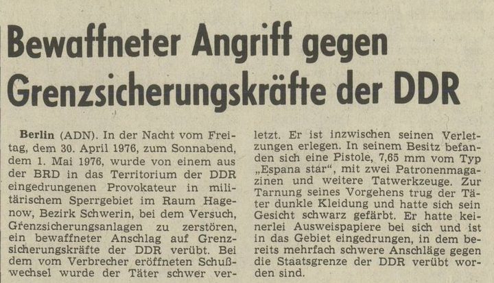 A newspaper report in two columns under the headline Bewaffneter Angriff gegen Grenzsicherungskräfte der DDR, datelined Berlin (ADN)