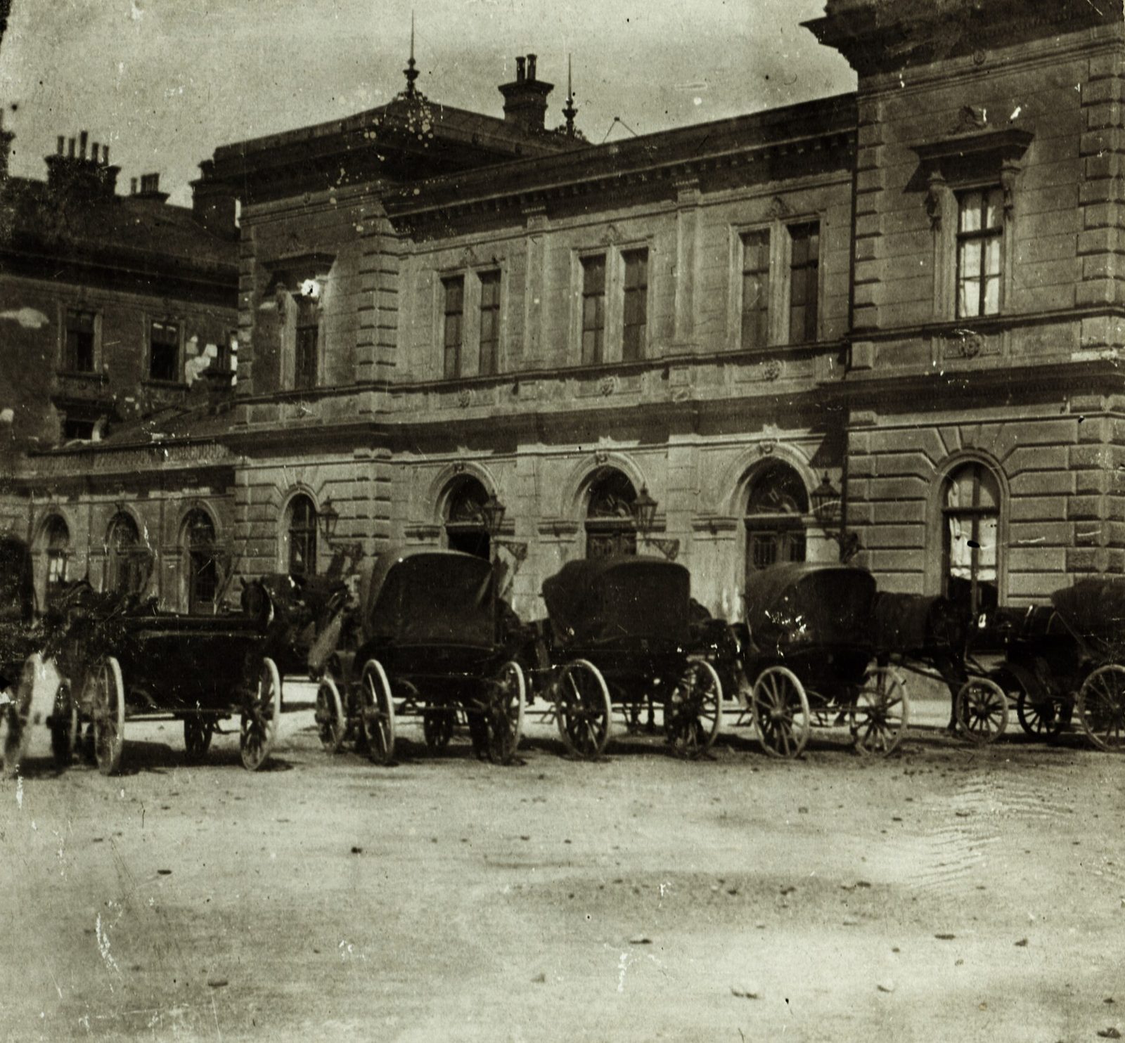 Horse cabs drawn up in front of the station building at Bratislava in an early photograph