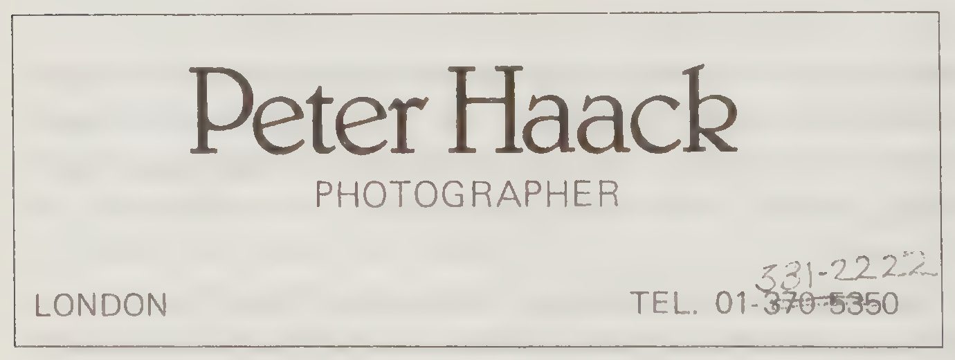 A business card reading Peter Haack, Photographer, London, with a telephone number corrected by hand